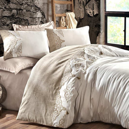 Vintage bedroom designed with a bed linen set in antique bronze color and white